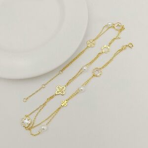 Tory Burch Elegant Gold and Pearl Women's Bracelet